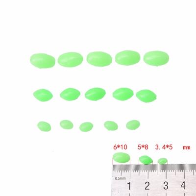 China Outdoor Activities Fishing Plastic/Soft Rubber Oval Hard and Round Luminous Fishing Beads Fishing Float Stopper Glow Beans for sale