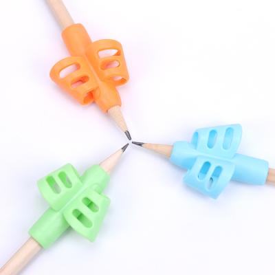 China Topper Colorful Writing Stationery Silicone Pencil Practice Grips For Kids Writing for sale