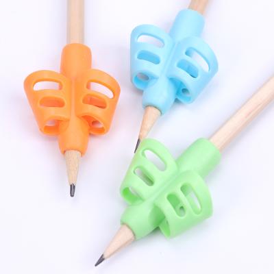 China Topper Wholesale Silicone Stationery Three Finger Writing Pencil Holder for Kids Grip for sale