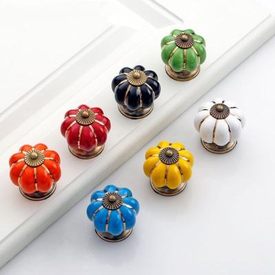 China Modern Hot sale Door Hardware Dresser Knob Cupboard Wardrobe Cabinet Pull Ceramic Pumpkin Knobs for sale