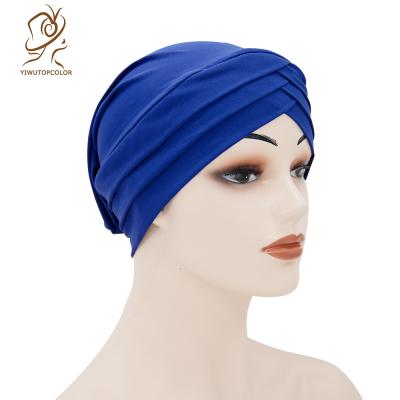 China Solid Color Flower Turban Hat Hijib Muslim Turban Wrap Hat Comfortable Simple Knotted Head India Hat for sale