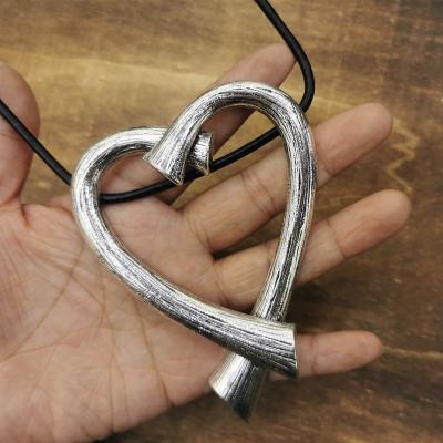 China Retro New Heart Shape Pendant Long Necklace Silver Plated Black Leather Rope Long Chain Necklace For Women for sale