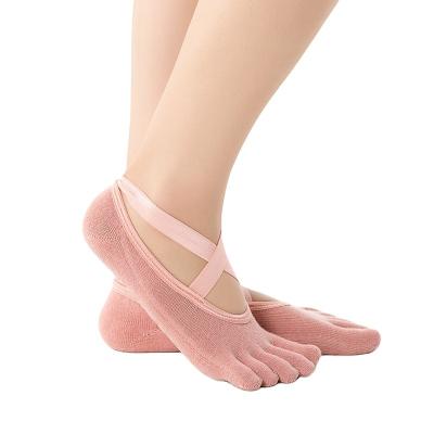 China Sports Fitness Professional Beginner Non-slip Sporty Pilates Breathable Trampoline Straps Grips Yoga Five Finger Socks for sale