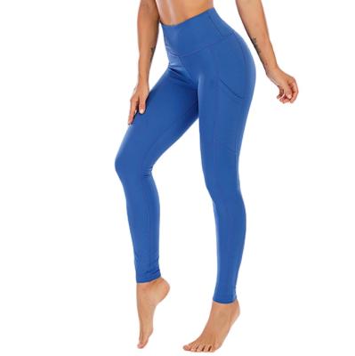 China Breathable High Waisted Booty Solid Color Yoga Pants Fitness Lifting Wear With Pockets for sale