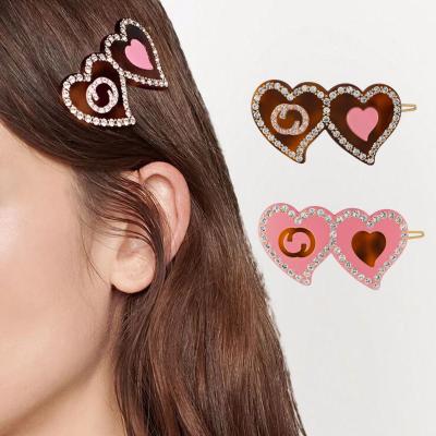 China New Style Hair Pin Words GG Hairpin Acrylic Pink Hair Clip European and American Metal Heart Hairpin Metal Heart Double Side Cut Diamond Hair Accessory Korean Exquisite for sale