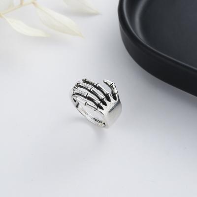 China Retro Vintage Hip Hop Palm Shape Ring Personality Punk Gothic Couple Ring Men for sale