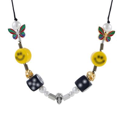 China Hiphop Customize Hip Hop Cut Out Skull Bead Smile Face Butterfly Chain Choker Necklace for sale