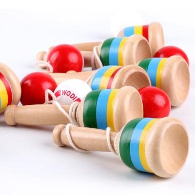 China Coordinating Wooden Ball Hand Cut Eye Sports Catching Educational Toys For Children for sale