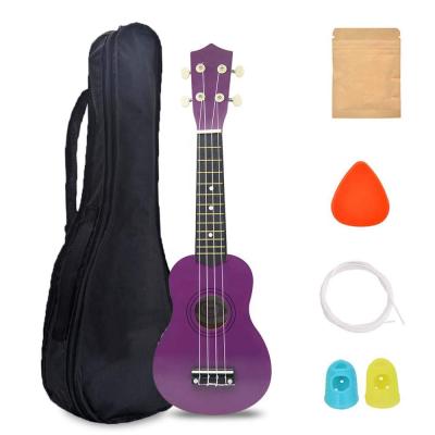 China 21 inch mahogany wood ukulele with bag, finger pits and string for sale