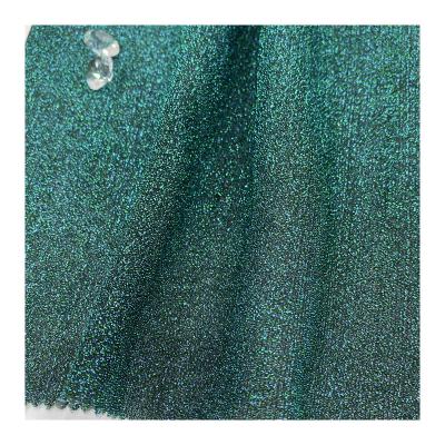 China Breathable Pattern New Fashion Custom Design Breathable Shrink-Resistant Green Shiny Metallic Sequin Fabric for sale