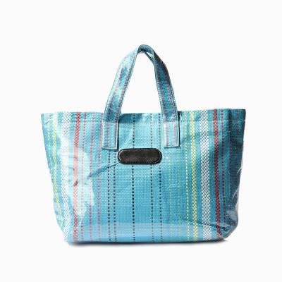 China New Style Fashion Large Folding PVC Durable Water Resistant Woven Tote Bag for sale