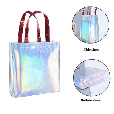 China Custom everyday life logos eco non woven holographic tote bag for clothing advertise reusable laser gifts shopping bag for sale