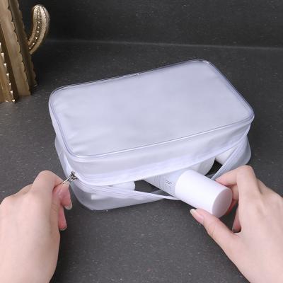 China Fashion scrub cosmetic bag travel cosmetic wash neceser custom makeup bag PVC toiletry set travel beauty toiletry bag for sale