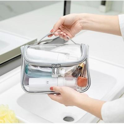 China NATIONAL PVC Cosmetic Travel Bags Clear Transparent Envasadora Para Pouch Stand Up Makeup Pouch Bags Aid Cosmetiquera With Zipper for sale