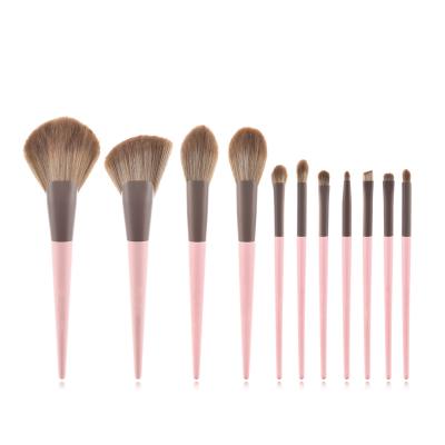 China Angular Blush Natural Pink Yellow Makeup Brush Set 11pcs Utra Soft Synthetic Hair Cosmetic Makeup Brush Set for sale