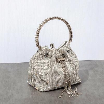 China Women's Designer Portable Luxury Purse Chain Metal Ring Handle Shiny Crystal Bucket Women's Clutch Evening Bag Tassel Diamond Bridal Wedding Party for sale