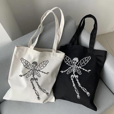 China Canvas Portable Punk Print Skull Butterfly Print Harajuku Shoulder Bag Gothic Casual Vintage Hip-Hop Shopper Large Capacity Insist Women Bags for sale