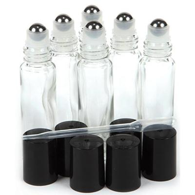 China Cosmetic made in china 3ml 5ml 10ml clear blue amber glass roller bottle with black plastic stainless steel ball cap for sale