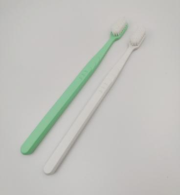 China Eco-Friendly Biodegradable Sugarcane PLA Toothbrush With Bio Based Bristle Cornstarch PLA Toothbrush Eco Friendly Adult Customized Color for sale