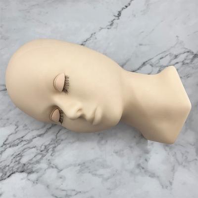 China New Style Mannequin Head Black Training Practice Mannequin Head Training Head With Pull Out Eyelids For Training School for sale