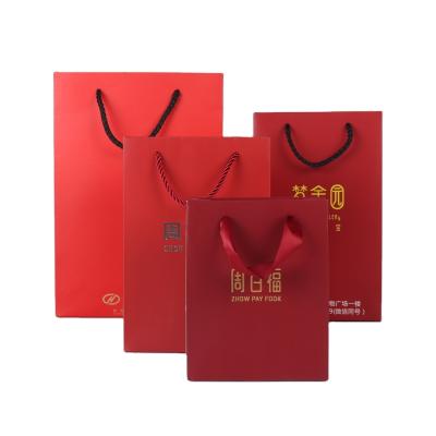 China Biodegradable Custom Logo Printing Boutique Carrier Bags Gift Commercial Luxury Shopping Paper Bag With Handle For Gift Apparel Packaging for sale