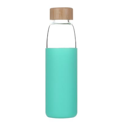 China Disposable Hot Style Glass Water Bottle With Rubber Cover And Bamboo Silicon Crystal Glass Water Bottle for sale