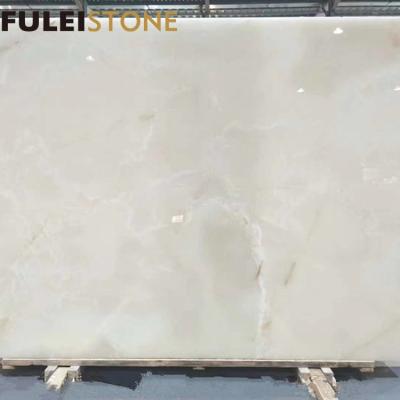 China Beautiful modern white color onyx stone slab product price for sale for sale