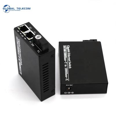 China FTTH 10 /100/1000M Ethernet Media Converter To 2Rj45 Fiber Optic Media Converter Price for sale