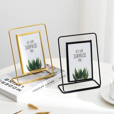 China Metal Photo Frame Flower Plant Fashionable Nordic Creative Glass Clip Dry Photo Frame Modern Home Decoration Office Gifts for sale