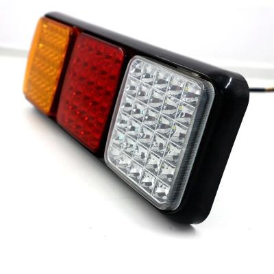 China Cheap Auto Lamp Car Accessories Amber White Red Rectangle Led Tail Light Stop Brake Light Led Truck Multifunctional Rear Lights for sale