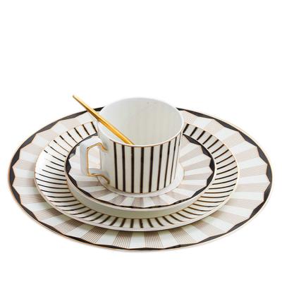 China Sustainable household hotsale tableware 4pcs/set stripes bone china ceramic black and white dinner set for sale