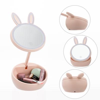 China Cute Animal Desk Mirror Lighted Rabbit Ears LED Lighted Cosmetic Makeup Mirror With Storage Case for sale