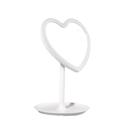 China Custom logo small lighted table lamp mirror heart shape makeup mirrors with led lights for sale