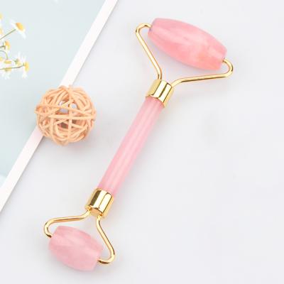 China Custom Face Roller Massager New Arrival Face Massager Tools Pink Rose Facial Crystal Roller Facial Massager for sale