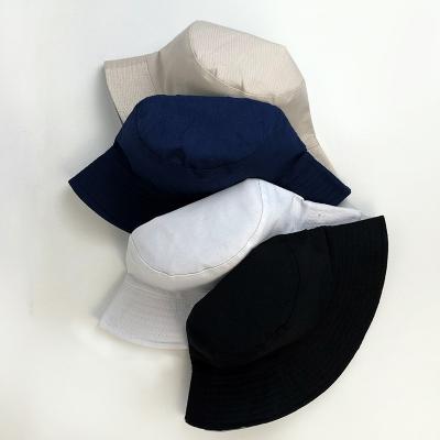 China Wide Brim Fisherman Sunshade Personality Outdoor Bucket Hat Striped Outdoor Recreational Bucket Hat With String for sale