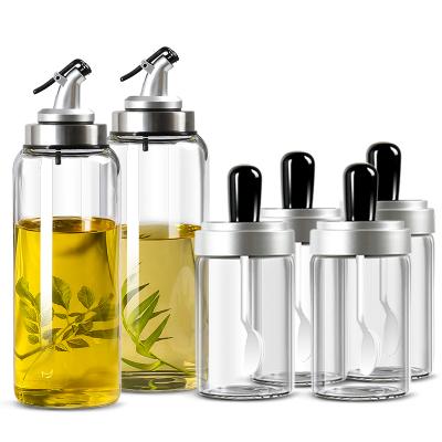 China Kitchen Sustainable Use Airtight Glass Condiment Bottle With Spoon Lid Design For Pepper Spice Salt Sugar for sale