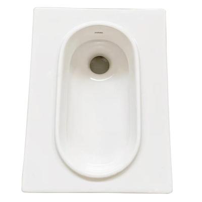 China Floor Hidden Cistern Porcelain Squatting Pan Cheap Price For Sale Hot Selling Public Indian Toilet Pan for sale