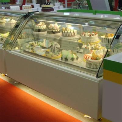 China Refrigerated High Temperature Curved Glass Display Bakery Cake Showcase for sale