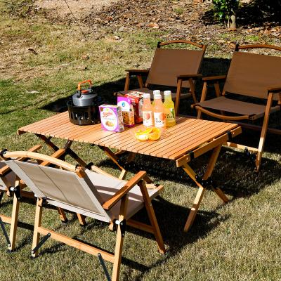 China Contemporary Outdoor Korean BBQ Egg Roll Table Primary Color Beech Portable Folding Solid Wood Camping Picnic Table for sale