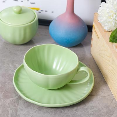 China Viable Ceramic Coffee Tea Cups Saucers Sets Green Restaurant OEM Customized Afternoon Tea Cup Saucer Bone China Cup Set UK Gift for sale