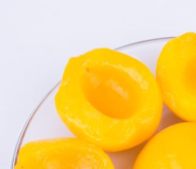 China 3000g canned canned yellow peach halves in heavy syrup for sale with factory price for sale