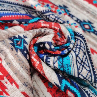 China DIMENSIONAL New style polyester spandex soft yarn hacci sweater knit ethnic style printed fabric for clothing for sale