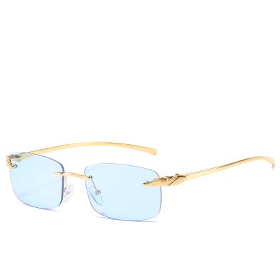 China European rimless new style rimless sunglasses and American small frame ladies sunglasses shape sunglasses for sale