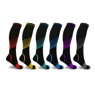 China Breathable Compression Sports Knee High Socks For Women And Men Running Socks for sale