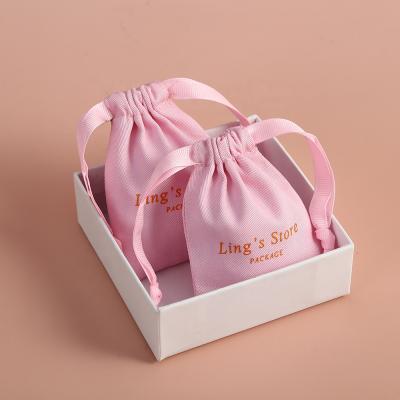 China Soft and high quality canvas cotton personalized pink drawstring bag with double grosgrain satin ribbon jewelry pocket for sale