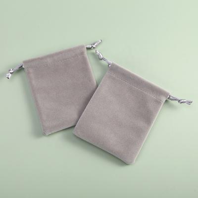 China Wholesale Custom Soft and High Quality 10x15cm Supplier Gift Drawstring Velvet Flannel Jewelry Drawstring Pouch Bag Gift Bag for sale