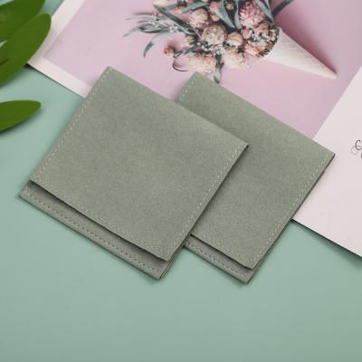 China Hot Selling Soft And High Quality Microfiber Comfortable Light Green 6*6cm Envelope Custom Jewelry Packaging Pouches for sale