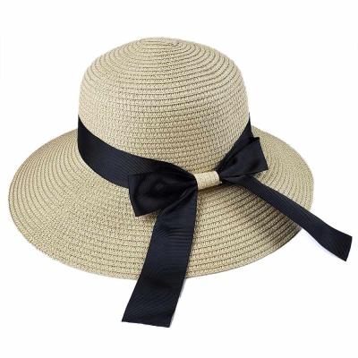 China Solid Color Women Beach UV Bucket Hat Travel UPF50 Sun Straw Hat Summer Foldable Brim UV Bucket Hat With Black Band for sale