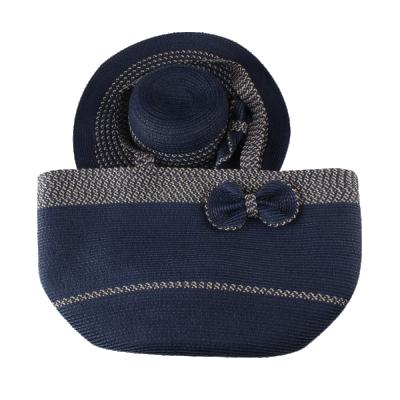 China 2020 Bowknot New Design Dark Blue Straw Shoulder Beach Bag With The Bowknot, Fashion Straw Hat With Bow Overall Stripped Design for sale