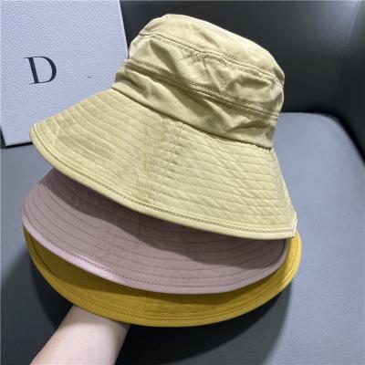 China 2021 New Design Bucket Hat Cotton Plain Cotton Ponytail Golf Portable Bucket Hat Adjustable Bucket Designer Hat for sale